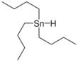 Skeletal formula of tributyltin with one explicit hydrogen added