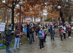 Landscape photo showing protestors demonstrating against retrenchment (lay-offs) at Indiana University of Pennsylvania