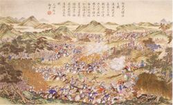 Another battle scene, this one from a greater distance with mountains in the background