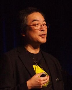 Toru Iwatani, creator of Pac-Man, at GDC 2011 (cropped to upper body).jpg