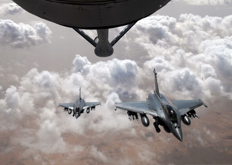 File:Two French Air Force Rafale fighter aircraft, below, prepare to break formation after refueling with a U.S. Air Force KC-135 Stratotanker aircraft with the 351st Expeditionary Air Refueling Squadron over Mali 130423-F-DT859-086.jpg