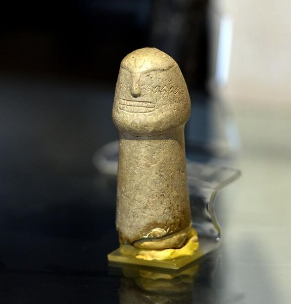 File:Stone figurine, a primitive representation of a human figure. From Nimrik village, now submerged, Mosul Dam, Iraq. 8000-5000 BCE. Iraq Museum.jpg