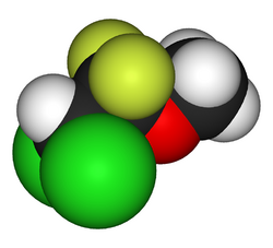 A space-filling model, or three-dimensional structure of the methoxyflurane molecule, in red, yellow, green, black and white.