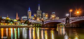 Melbourne CBD and Princes Bridge at night (2013).jpg