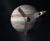 Juno spacecraft with Jupiter in the background