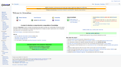 A screenshot of a webpage with a layout similar to Wikipedia's, but with a bright green banner imploring donations in the central bottom left.