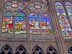 Elaborate stained glass windows in the choir of the Basilica of Saint Denis