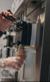 Dispensing soft serve from a commercial soft serve machine.png