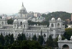 White building with multiple domes