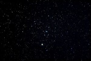 The Hyades is a naked-eye open cluster in the constellation of Taurus. Aldebaran is bright star in bottom-middle. The "V" of Taurus is pointing to the top-right corner.