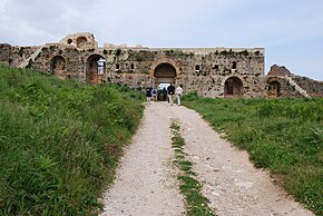 Western gate of Nicopolis, an example of a new polis created by the synoecism of a number of others, which were left abandoned; i.e., Augustus relocated the populations of the surrounding poleis into a new central polis called "Victory City" to commemorate the naval battle of Actium in 31 BC. The reasons were undoubtedly economic, as the new polis brought great prosperity into the area.[3]