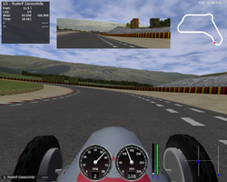 The cockpit of a racing car, with various 2D dynamic instruments displaying speed, rpm, fuel left, damage, G-Forces, clutch situation, a mini-map, the number of frames per second, a rear mirror, lap times and driver information.