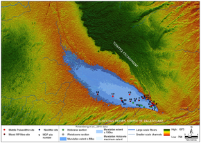 Figure 2. Newly discovered archaeological sites (by period) overlain upon the palaeohydrological reconstruction of the Mundafan area.png