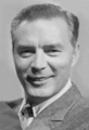 A black-and-white head shot of Art Fleming